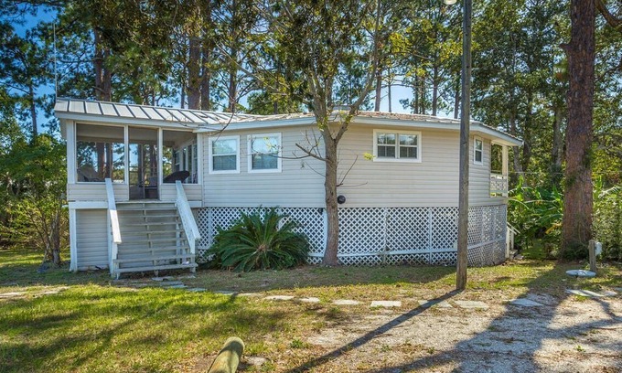 Carrabelle House | Morning Calm is what you will feel at this Very Nice, River Front Home.