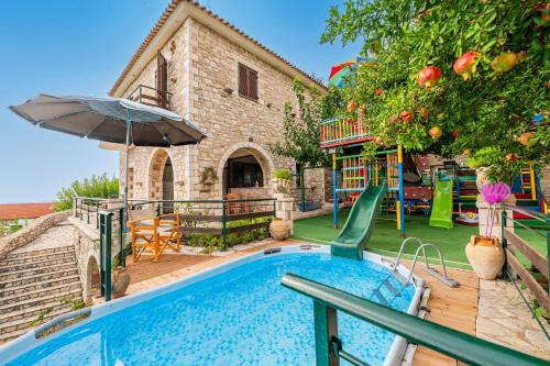 Lepreo Apartment | Mountain Oasis - Pool & Playground near Neda Falls