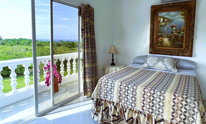 Cabrera Apartment | Mountain view suite with balcony, pool, sitting area, & more- close to beach!n