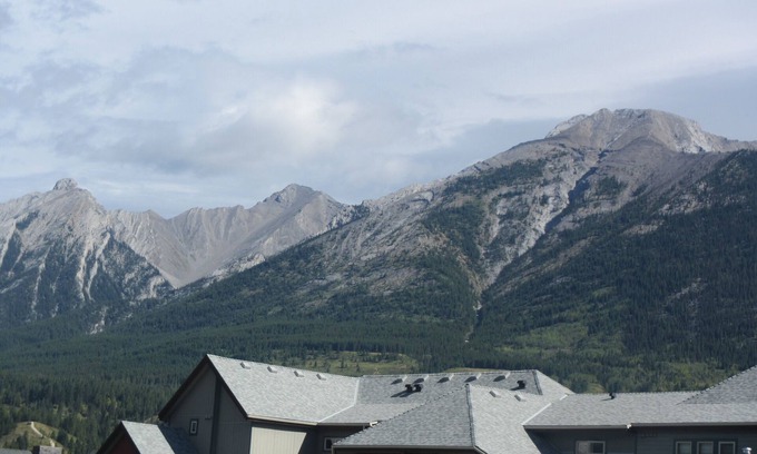 Canmore Condo | Mountain views, top floor, large deck, comfortable beds