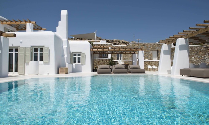 Tourlos Villa | My Rental Homes - Villa Opallia with spacious living and dining areas and a pool