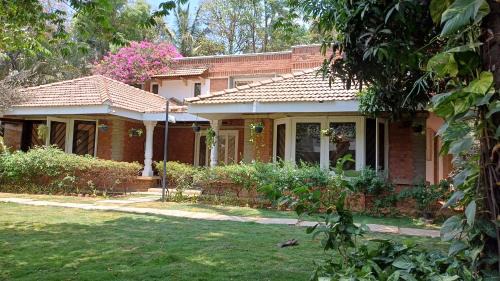 Palm Meadows Bed & Breakfast | Namma Ashram