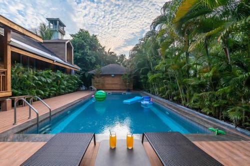 Morjim Villa | Nature's Abode - The Wooden Villa at Morjim by StayVista