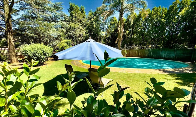 Greater Johannesburg Metropolitan Area House | Nature's Haven: 7-Bedroom Villa with Pool, WiFi & Serene Surroundings