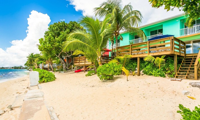 West Bay House | Nautilus Two – A Beachfront Condo on Seven Mile Beach - by Cayman Villas