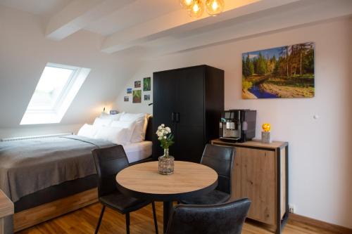 Bad Harzburg Apartment | NEU! 9,8 Außergewöhnlich Bergblick mit Balkon Boxspringbett Kaffeevollautomat inkl Bettwäsche Handtücher #MeeneFewo de