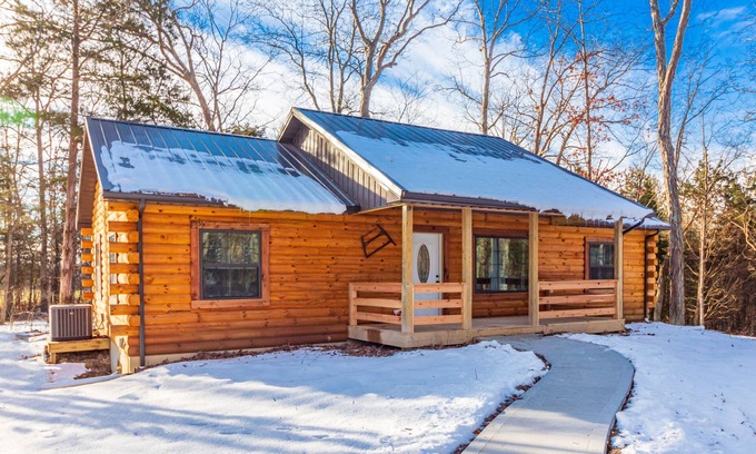 West Union Cabin | New 3 Bedroom Log Cabin nestled in the woods with one acre fishing lake .