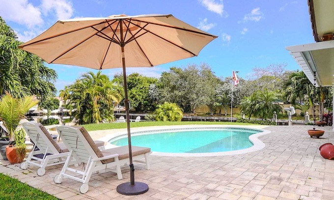 Cypress Lakes House | New! Amazing Waterfront Island Breezes - Heated Pool, Dock!