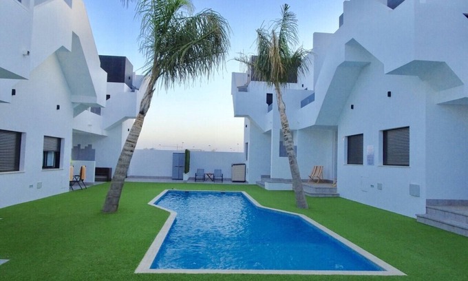 Los Cuarteros Apartment | New apartment with large roof terrace and swimming pool, near the sea and beach