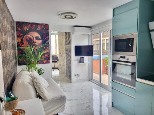 Las Palmas de Gran Canaria Apartment | New Attic with Terrace and Air Conditioning at Las Canteras Beach Parking Optional