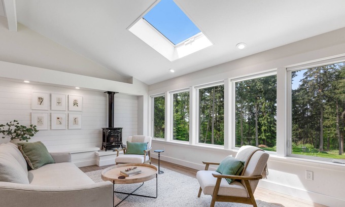 Freeland Cottage | New construction - upper-level home with expansive deck & orchard views