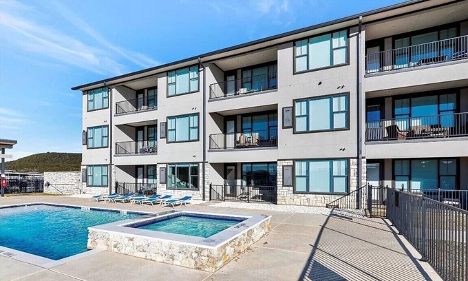 Graford Condo | NEW! First Floor Pool side PK Lake Luxury Condo - Hot Tub, FirePit, Gym, Laundry