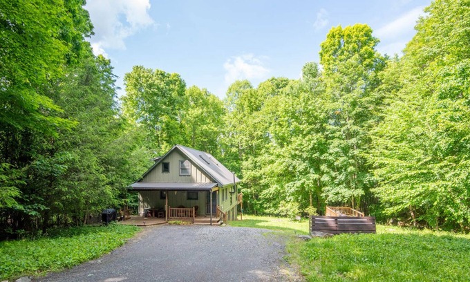 Warrensville Cabin | NEW! Getaway in Warrensville w/ Creek & Fire Pit