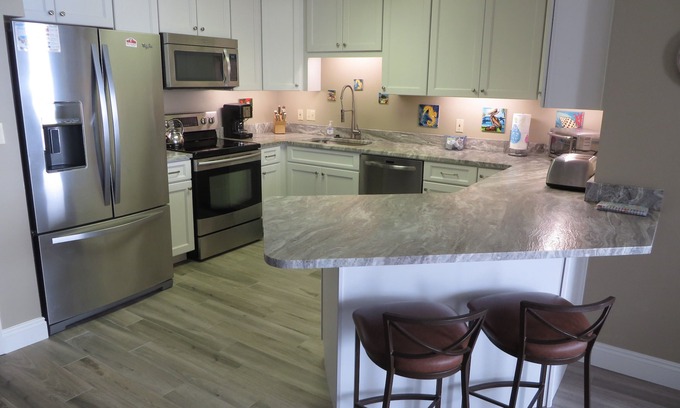 Orange Beach Condo | New in 2020! All new tile floors. New cabinets and granite counter tops