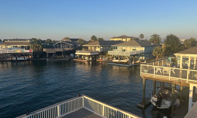 Jamaica Beach House | NEW LISTING -FULLY REMODELED CANAL HOME-PERFECT FOR FAMILIES & FISHING!