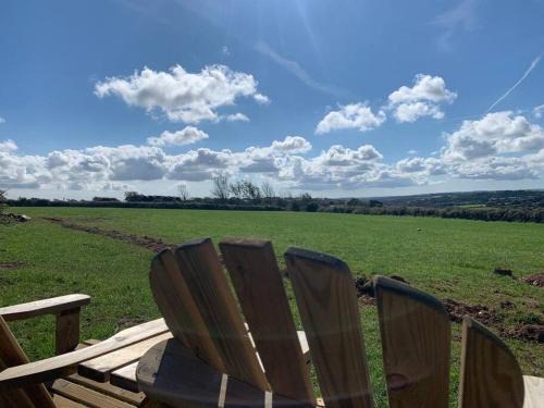Truro House | New! Lodge with hot tub, wood burner and fab views