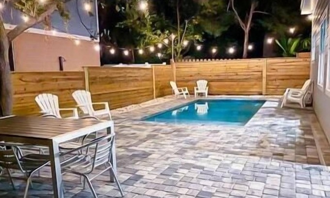 Vilano Beach House | New Luxury heated pool home, steps to the beach with two master suites!