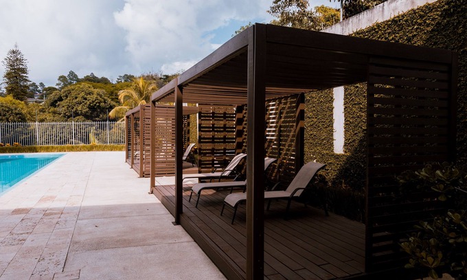 Guachipelin Apartment | New Luxury Loft with Pool by Corporate Stays