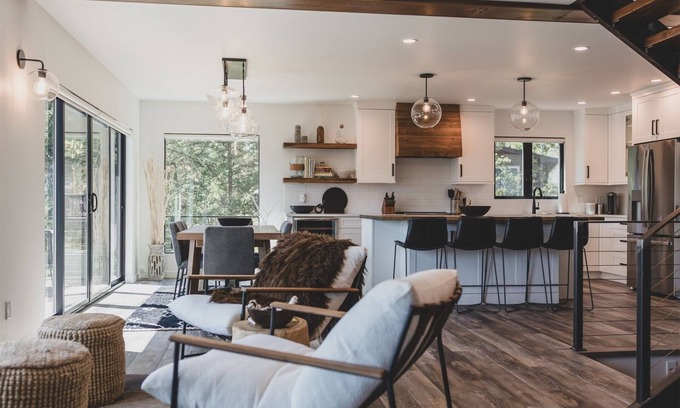 Whitefish House | NEW remodel w/wood burning fireplace, wraparound deck & lake views