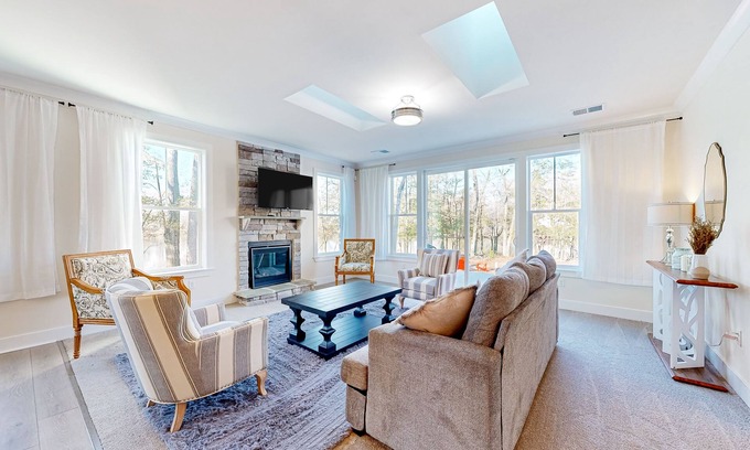 Seaford House | Newly built riverfront home with dock, kayaks, basketball court, & game room