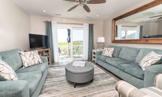 Oceanmarsh Subdivision Condo | Newly Listed Immaculate Condo - Distant Ocean Views - Pool and Beach Access
