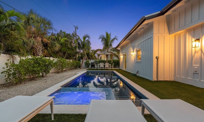 Holmes Beach House | Newly Remodeled and So Close to the Beach! Turf Yard! Pet Friendly!
