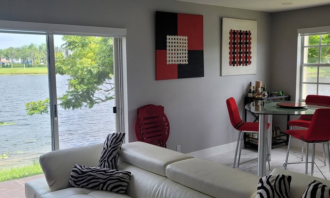 Pembroke Pines Condo | newly remodeled modern smart home on a lake