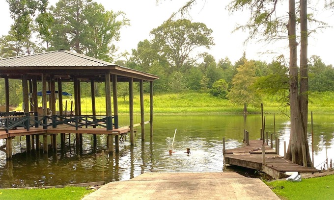 Negreet House | Newly Renovated Lakefront home with boat house, launch and 2 piers!