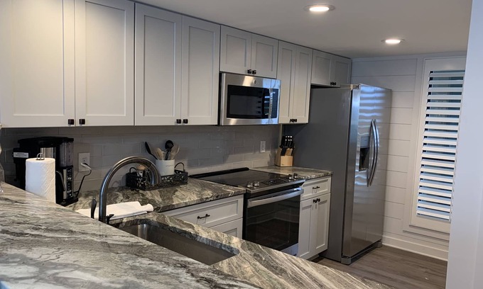 Orange Beach East Condo | Newly renovated Wind Drift condo overlooking beautiful Ole River.