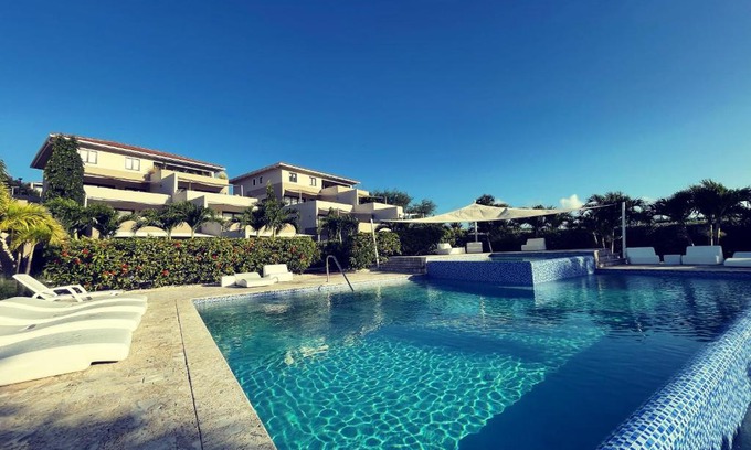 Sint Michiel Apartment | NEWLY STYLED Beach House 'White Sands' GreenView BlueBay Golf & Beach Resort Curaçao 2 bedrooms 2 bathrooms Gated Community Ground Floor Terrace Including Pool & Beach Access Fully Airconditioned Family Friendly