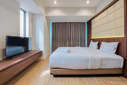 Bumi Serpong Damai Apartment | Nice and Spacious 2BR with Extra Room at Branz BSD City Apartment By Travelio