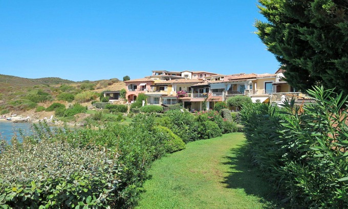 Baia Caddinas Apartment | Nice apartment for 6 guests with A/C, pool, WIFI, TV, terrace and pets allowed