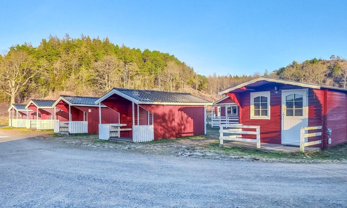 Stromstad O House | Nice small wooden cottage on natural plot by the sea fjord.