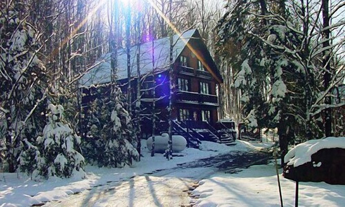 Stambaugh Ski Chalet | Nordic Haus chalet nestled in the serene woods of Ski Brule Village