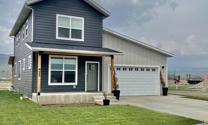 Ennis House | North 40 Farmhouse with Game Garage!