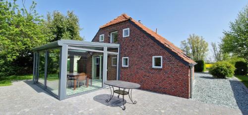 Neufunnixsiel House | Nr 150 - Ferienhaus An't Deep