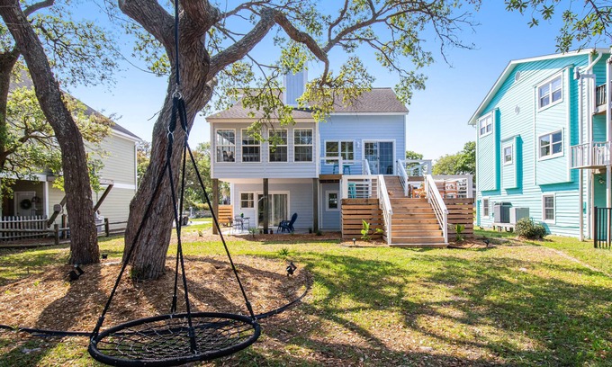 Long Beach House | Oak Island home on the Davis Canal with private boat dock.