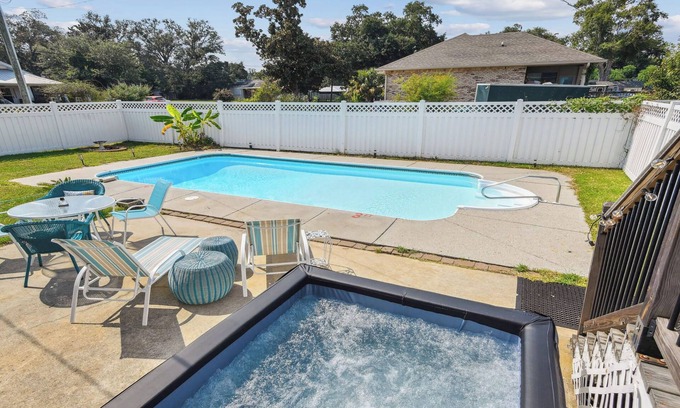 Gulfport Cottage | Oak trees, Heated Pool oasis & walk to beach! Drive to downtown 3 min!