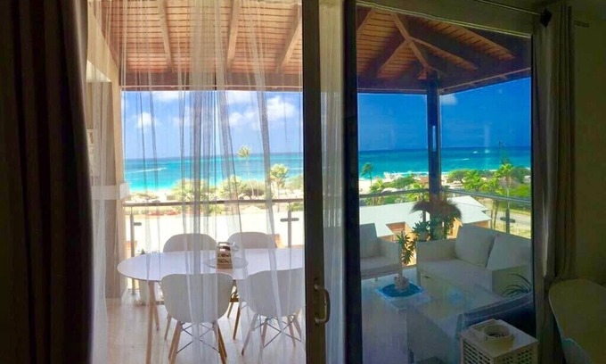 Oranjestad-West Apartment | Oasis Condominium ,Spectacular Sea view Big studio penthouse, ocean front,wifi,