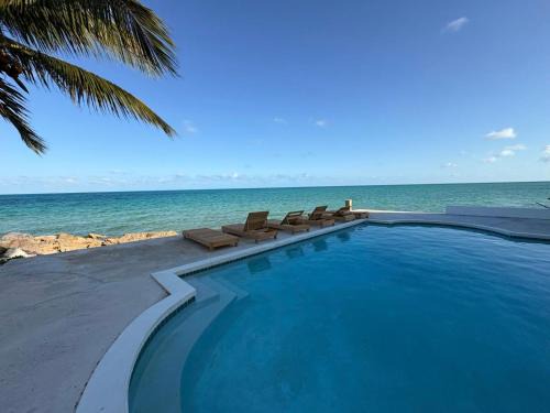 Palm Cay House | Ocean Breeze Studios