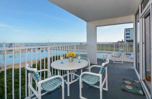 Bethune Beach Apartment | Ocean Condo 104 ~ Ground Floor Corner Condo with wrap around balcony Walk right out to Pool