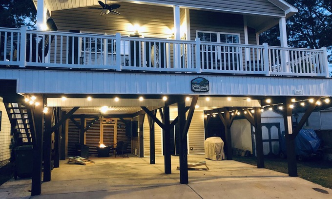 Surfside Beach House | Ocean Lakes - Site 1803 Pet-friendly! Enjoy outdoor seating area w/firepit & TV