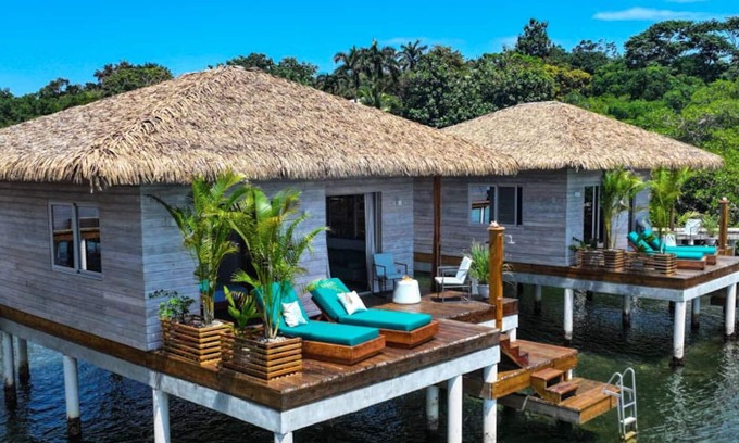 Isla Solarte House | Ocean Light Over Water Bungalow, Bedroom, King Bed, Living Room, Kitchenette