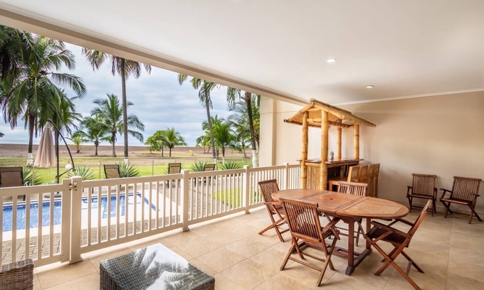 Barrio Los Faroles Condo | Oceanfront Beachfront condo The Palms Jacó Beach Vacation Rental 102 Costa Rica