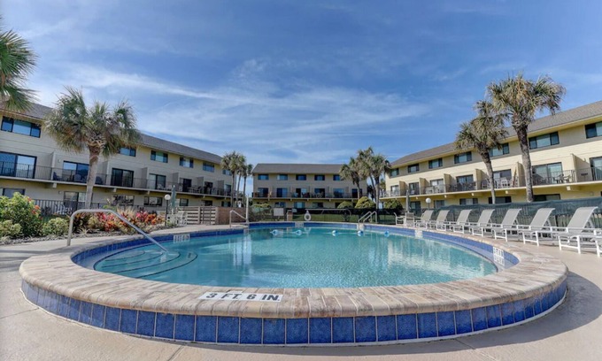 Crescent Beach Condo | Oceanfront family friendly condo with Pool, Playground, Tennis + Private Balcony