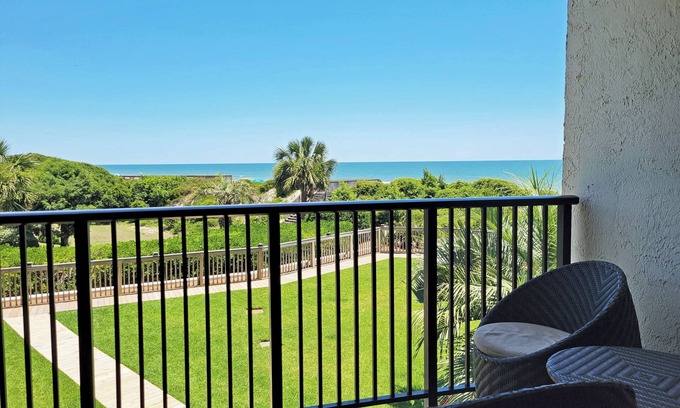 Litchfield by the Sea Condo | Oceanfront townhouse-style condo, 2 king beds, balcony, patio, pool, elevator