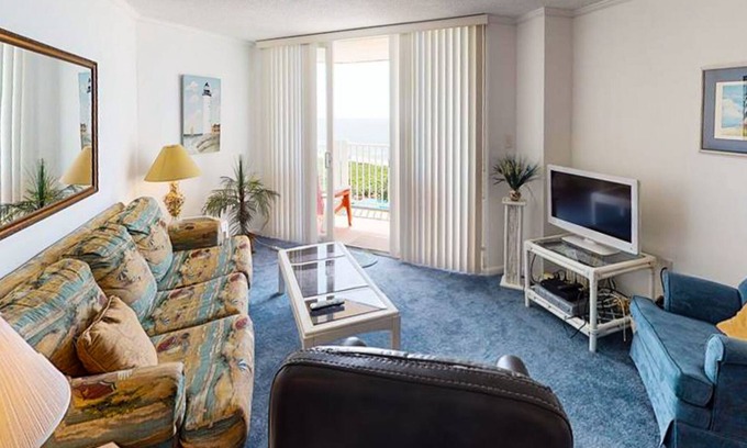 Sneads Ferry Condo | Oceanfront condo with a balcony with ocean & pool views, a gym & beach access
