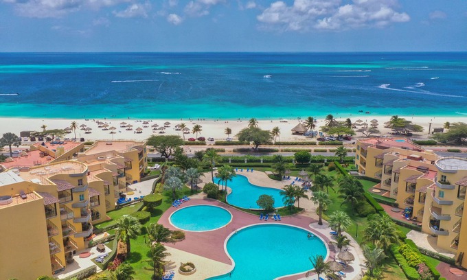 Oranjestad-West Condo | Oceania 4 bed 3 bath ocean view. Beachfront luxury, stunning Eagle Beach views
