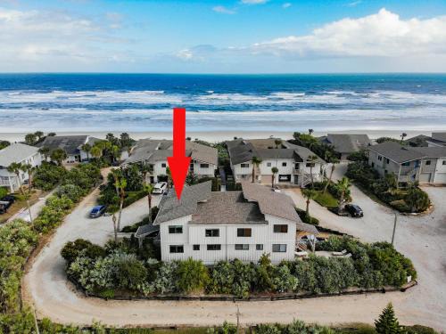 Sea Dunes Apartment | Octopus Garden A Luxurious Townhome Overlooking Pool Ocean Views