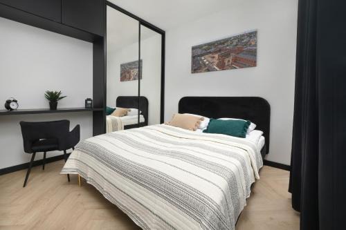 Srodmiescie Apartment | Ogrodowa Apartment Near Old Town by Noclegi Renters